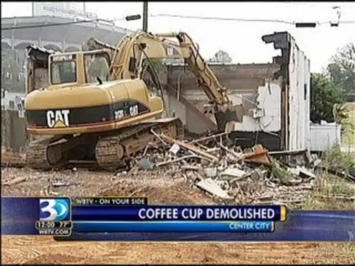 An image of the Coffee Cup being demolished.