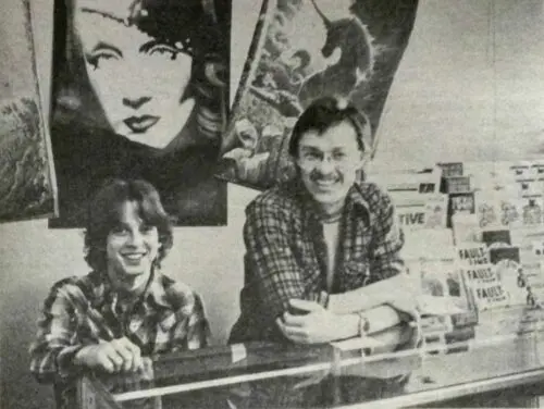 An image of Don W. King and another man behind the counter.