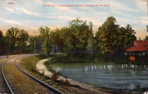 An image of a postcard showing the streetcar line at the amusement park.