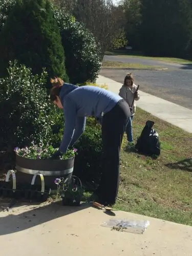 An image of Club members cleaning up the Polk site.