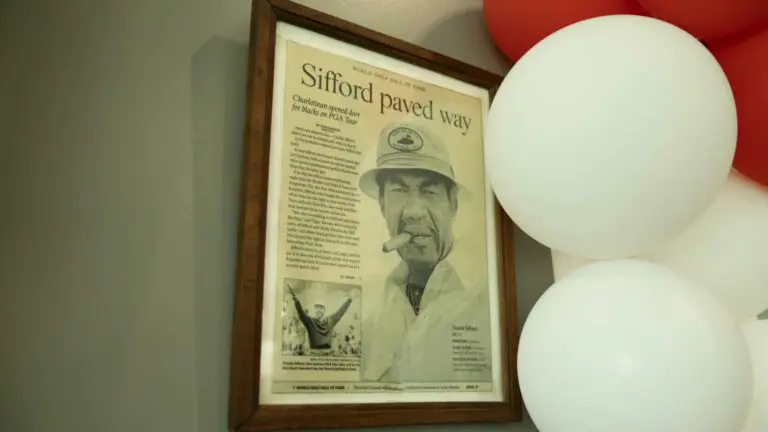 An image of a newspaper clipping honoring Dr. Charles Sifford.