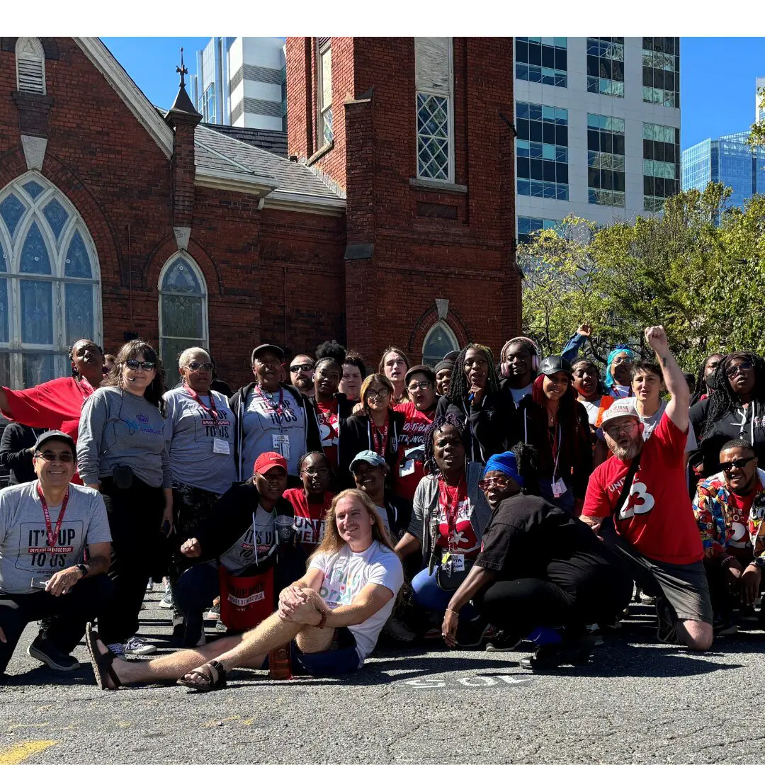 Levine Museum staff pictured with members of Unite Here. 